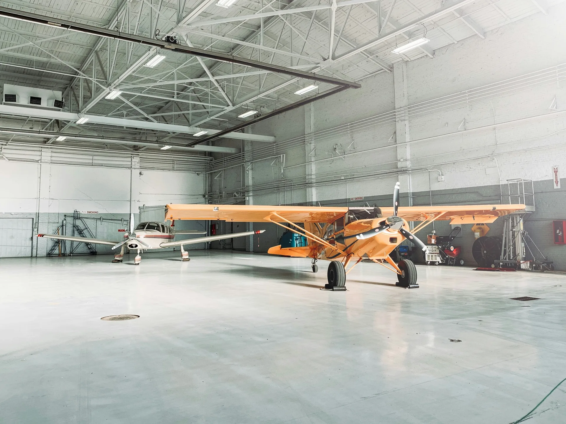 epoxy-coated aircraft hangar floor in a Laval facility