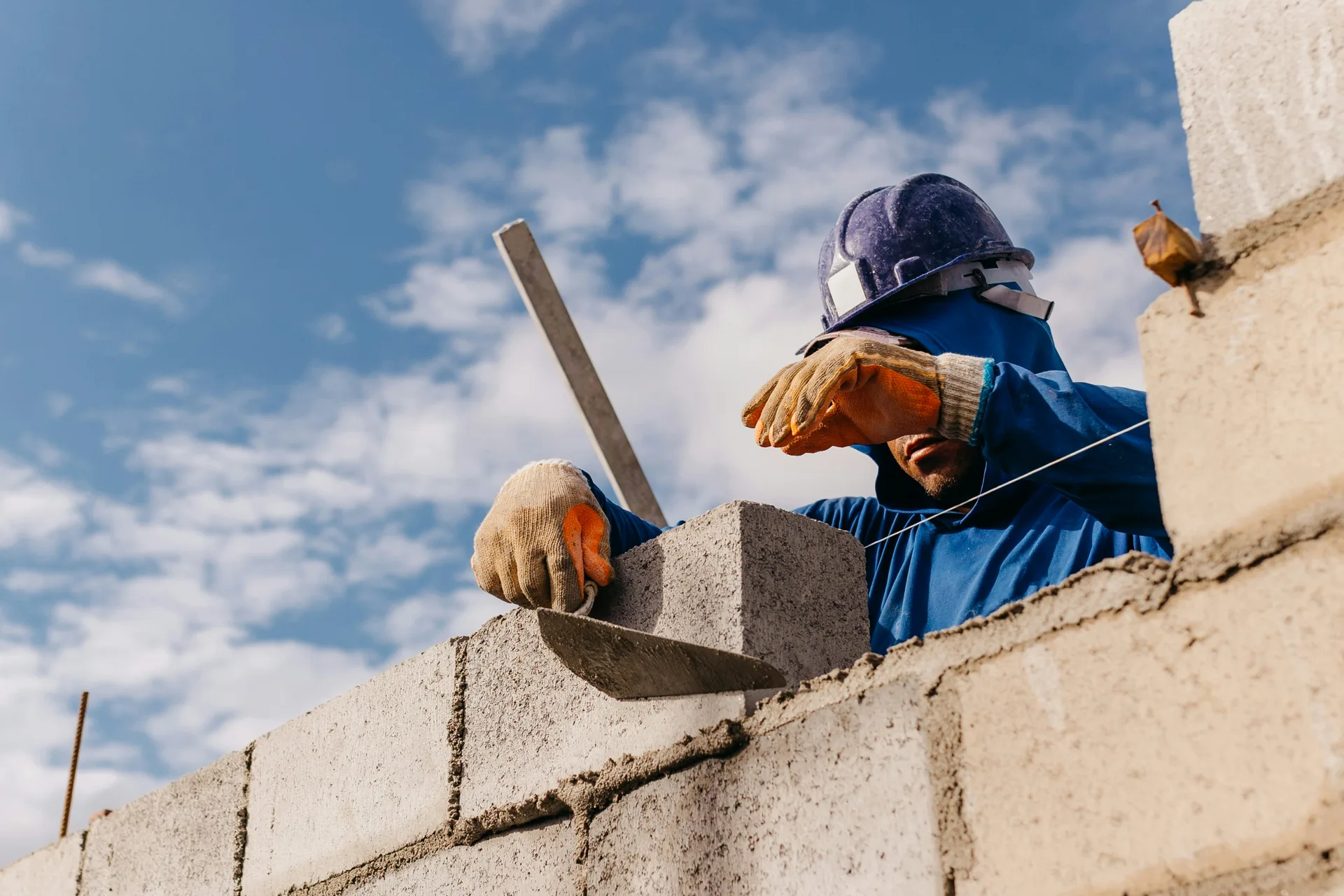 commercial block retaining wall under construction in Laval