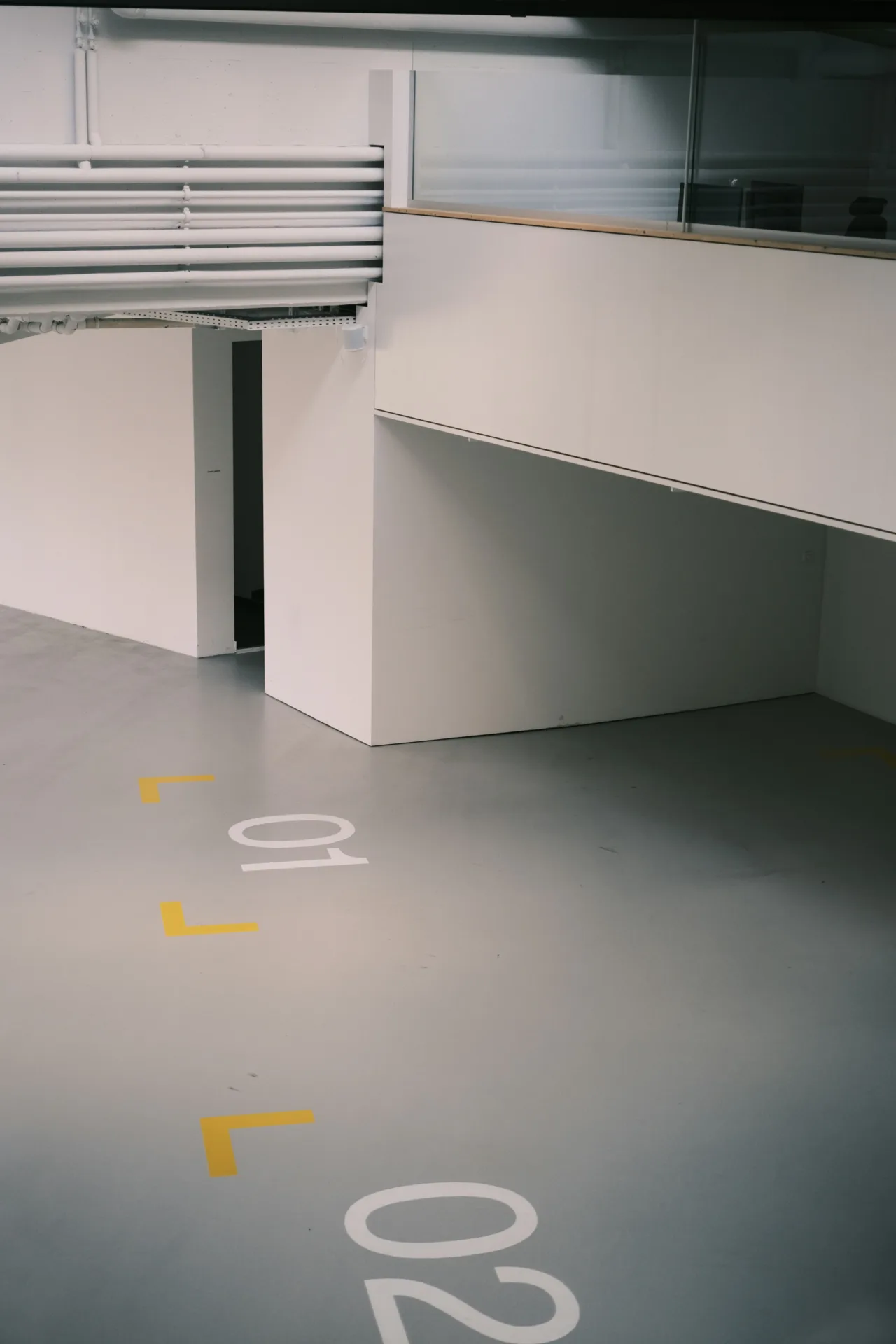 coated warehouse floor with line marking in a Laval facility