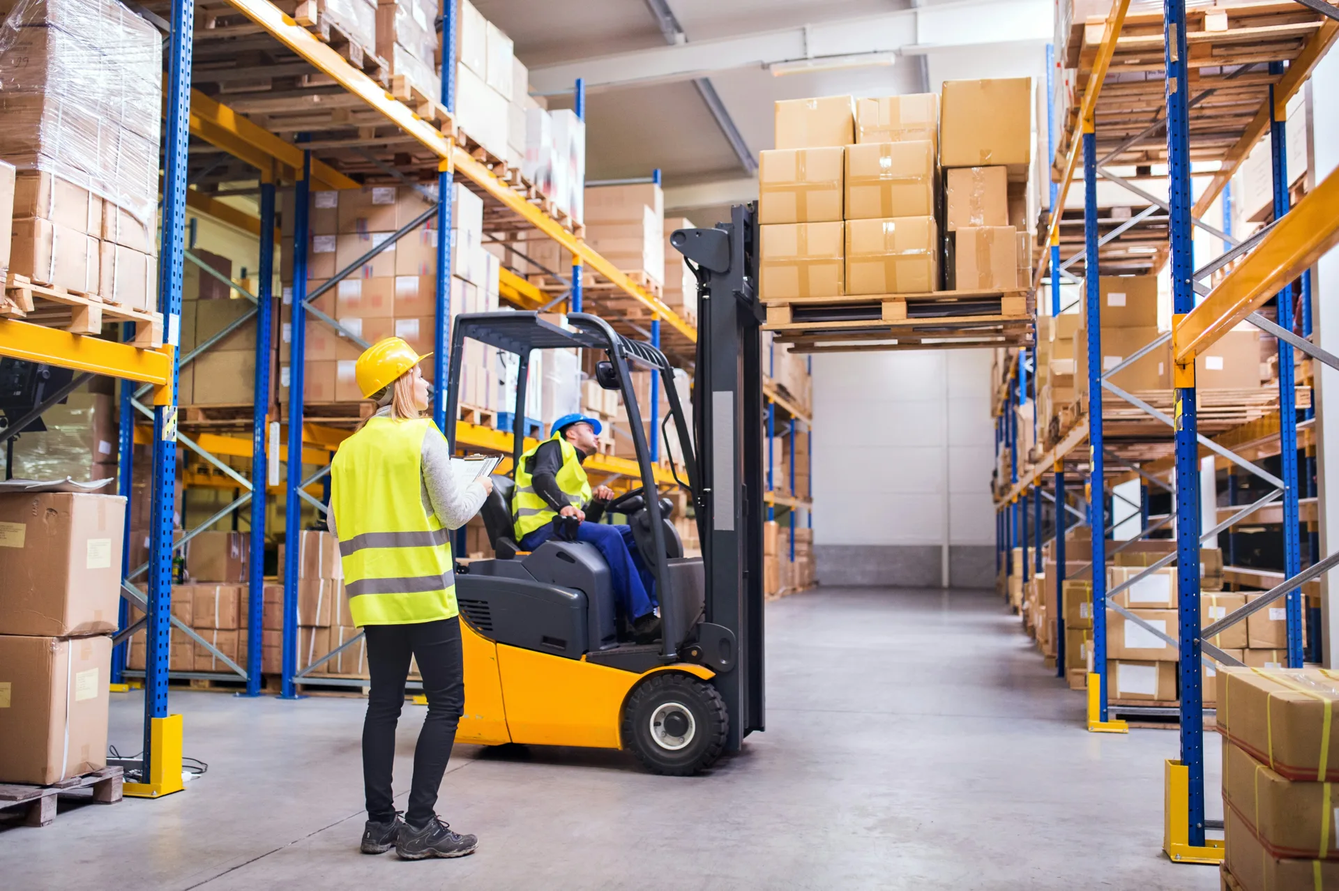 forklift on a finished warehouse concrete floor in Laval