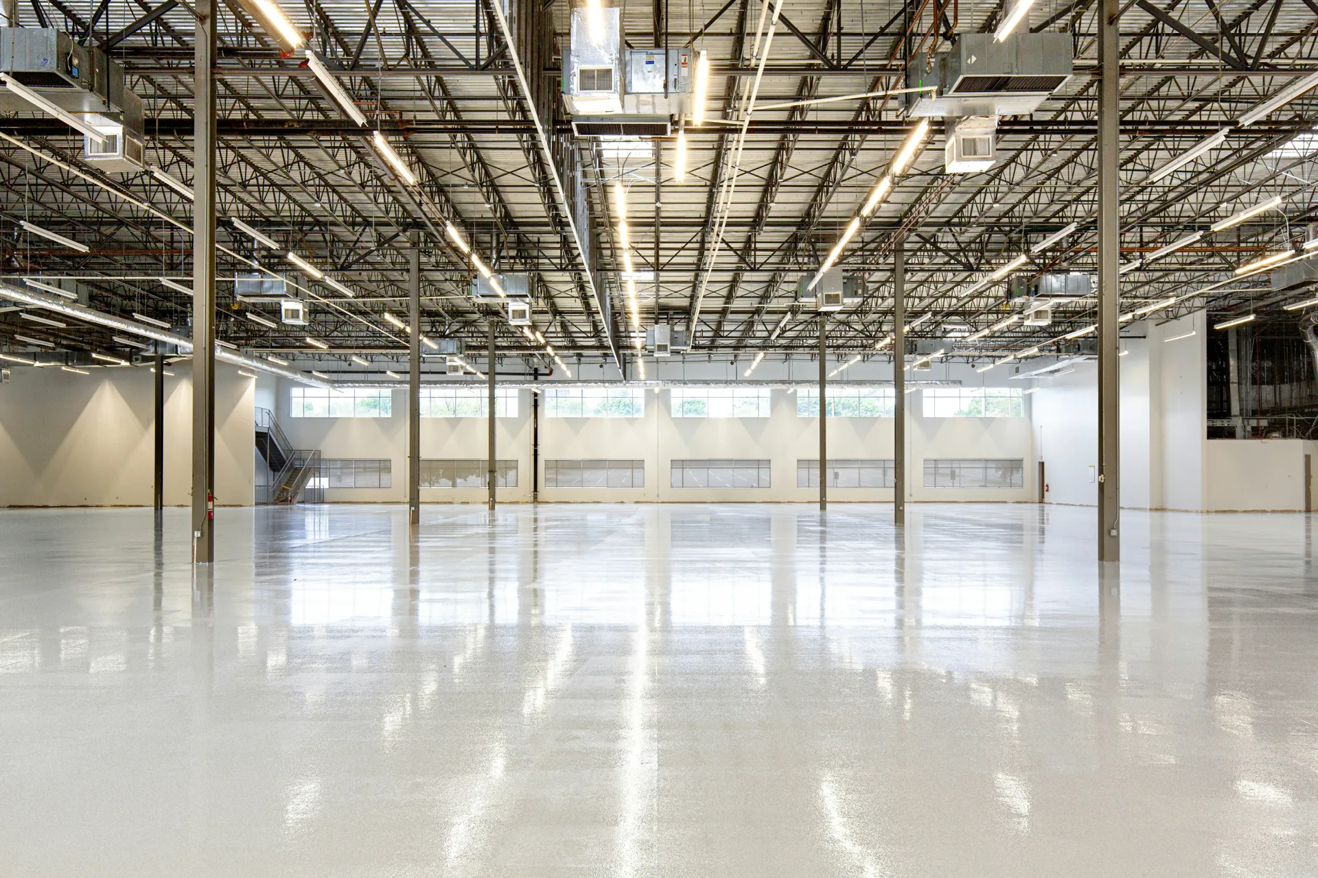 white epoxy coating on a Laval warehouse floor