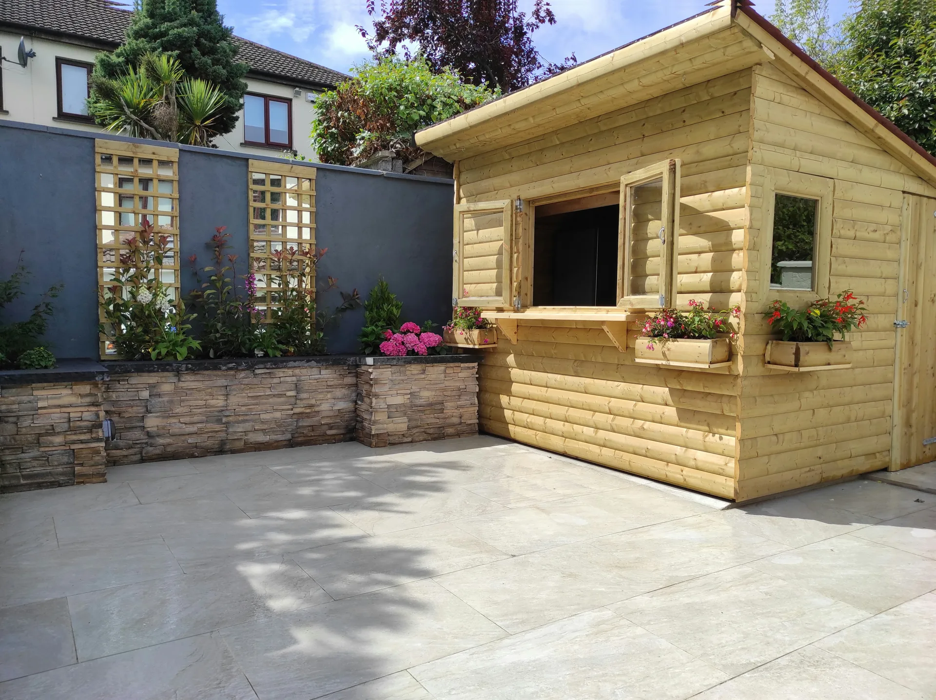 refreshed patio in a Laval garden after repair