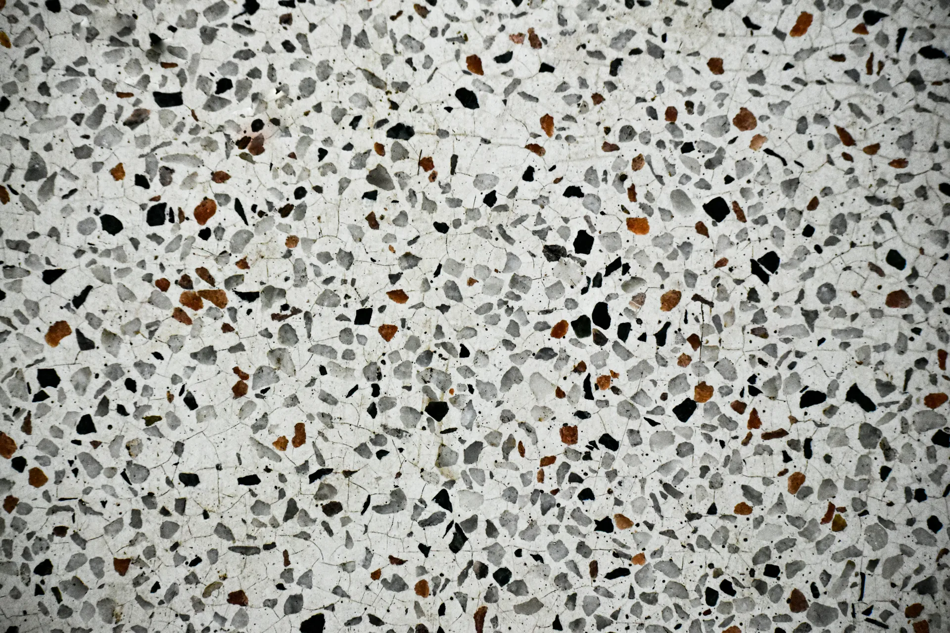 close-up of exposed aggregate concrete texture in Laval