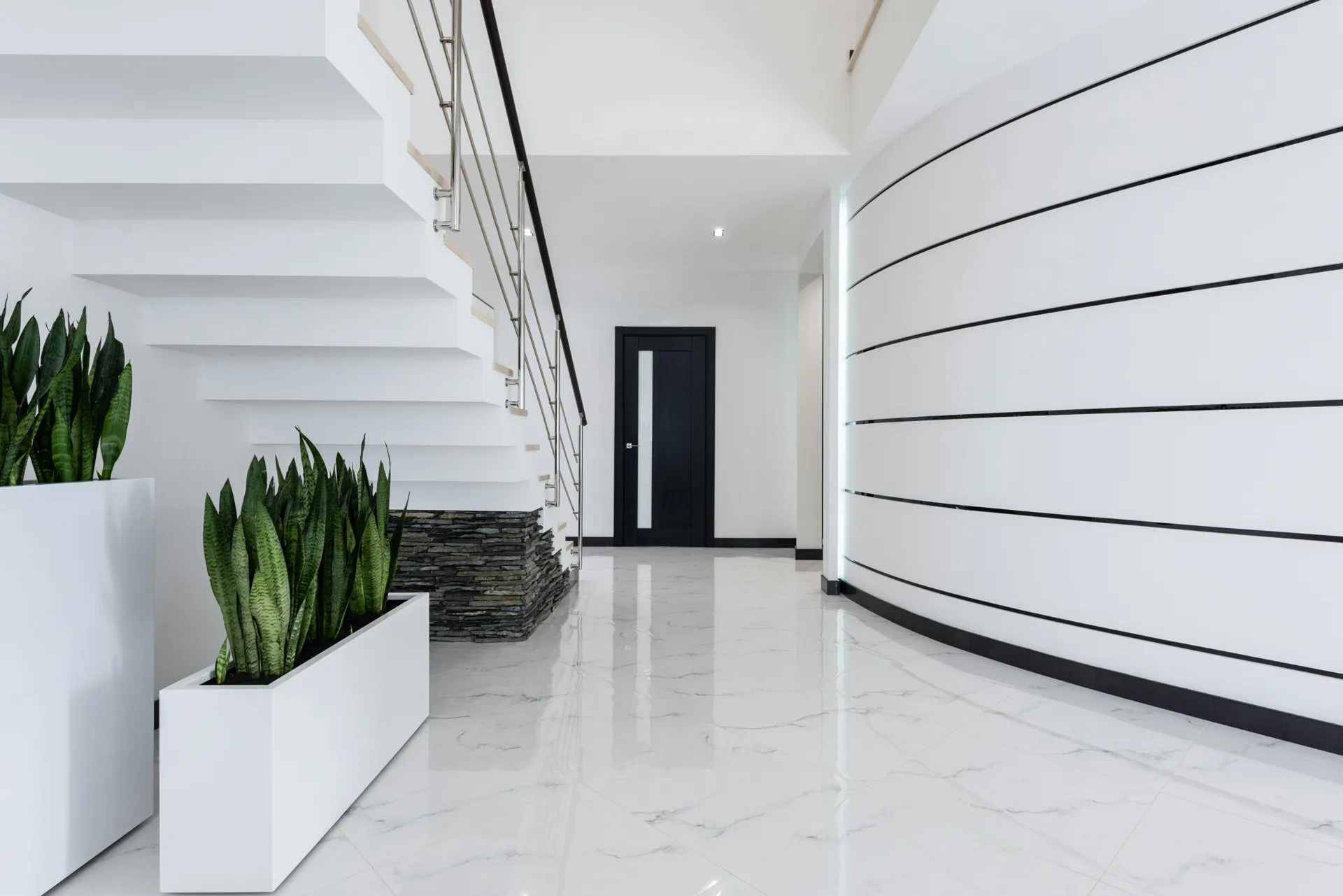 finished foyer floor over a Mapei underlayment in a Laval home