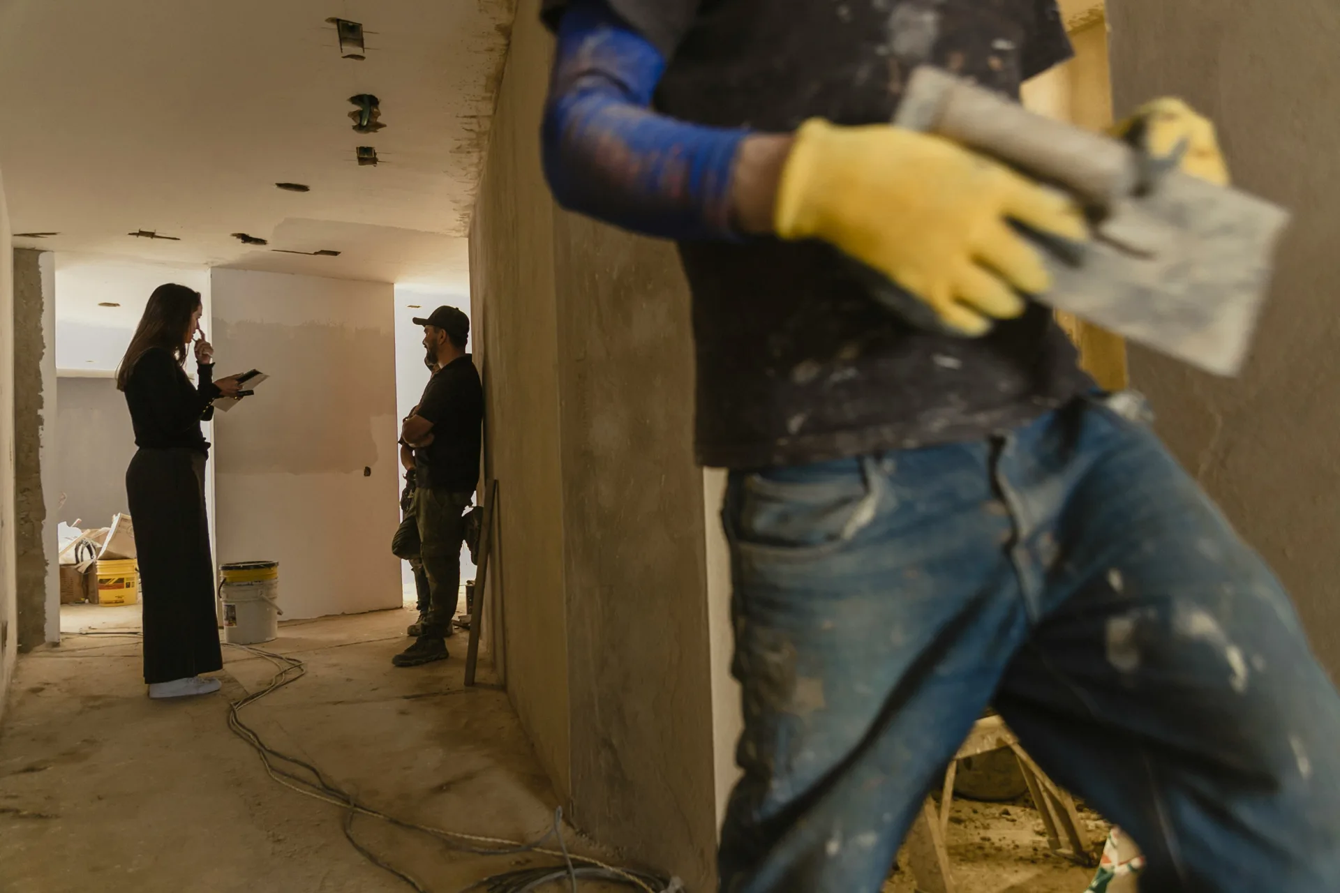 thin concrete overlay being applied with Ardex products in Laval