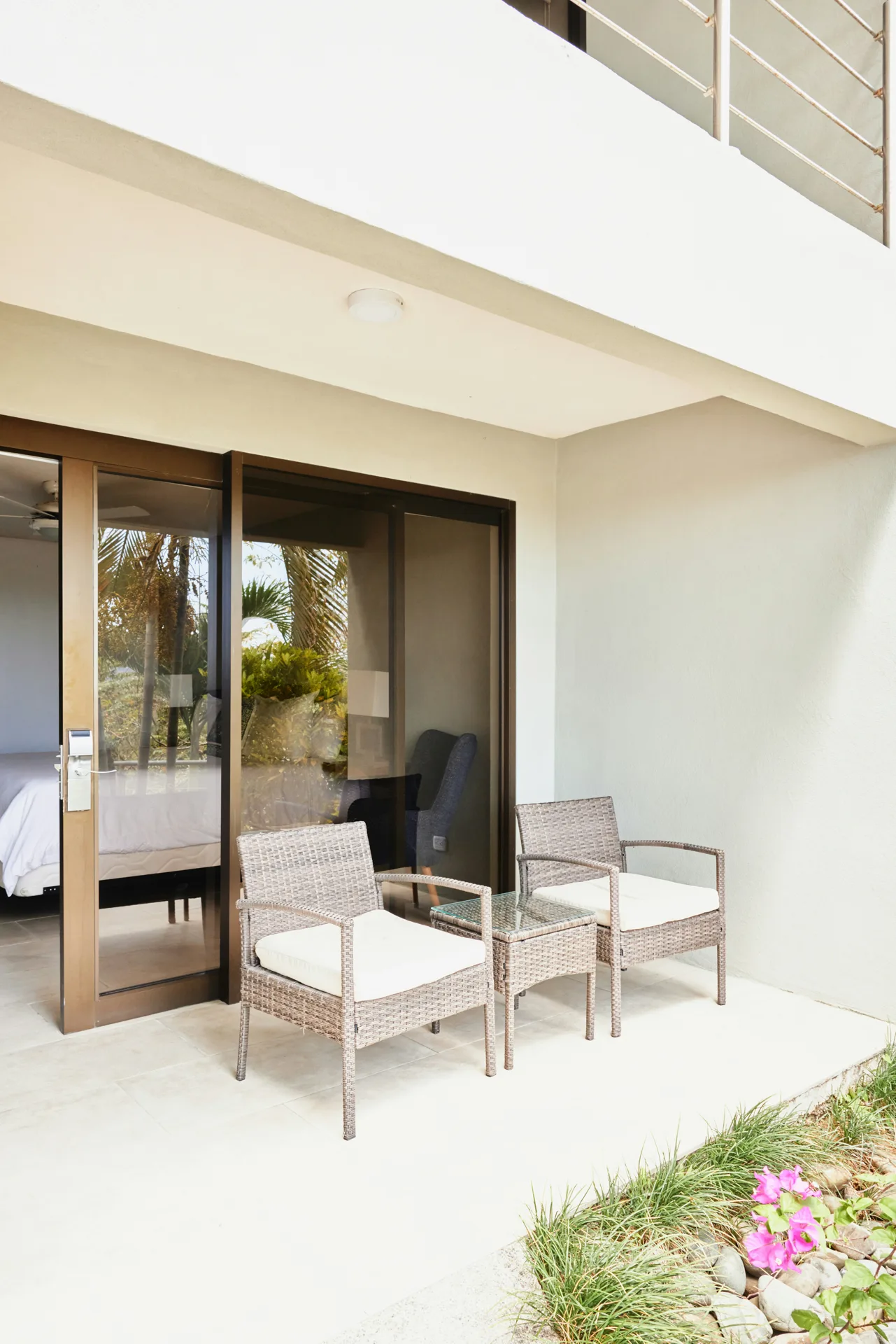 concrete patio pad off sliding doors at a Laval home