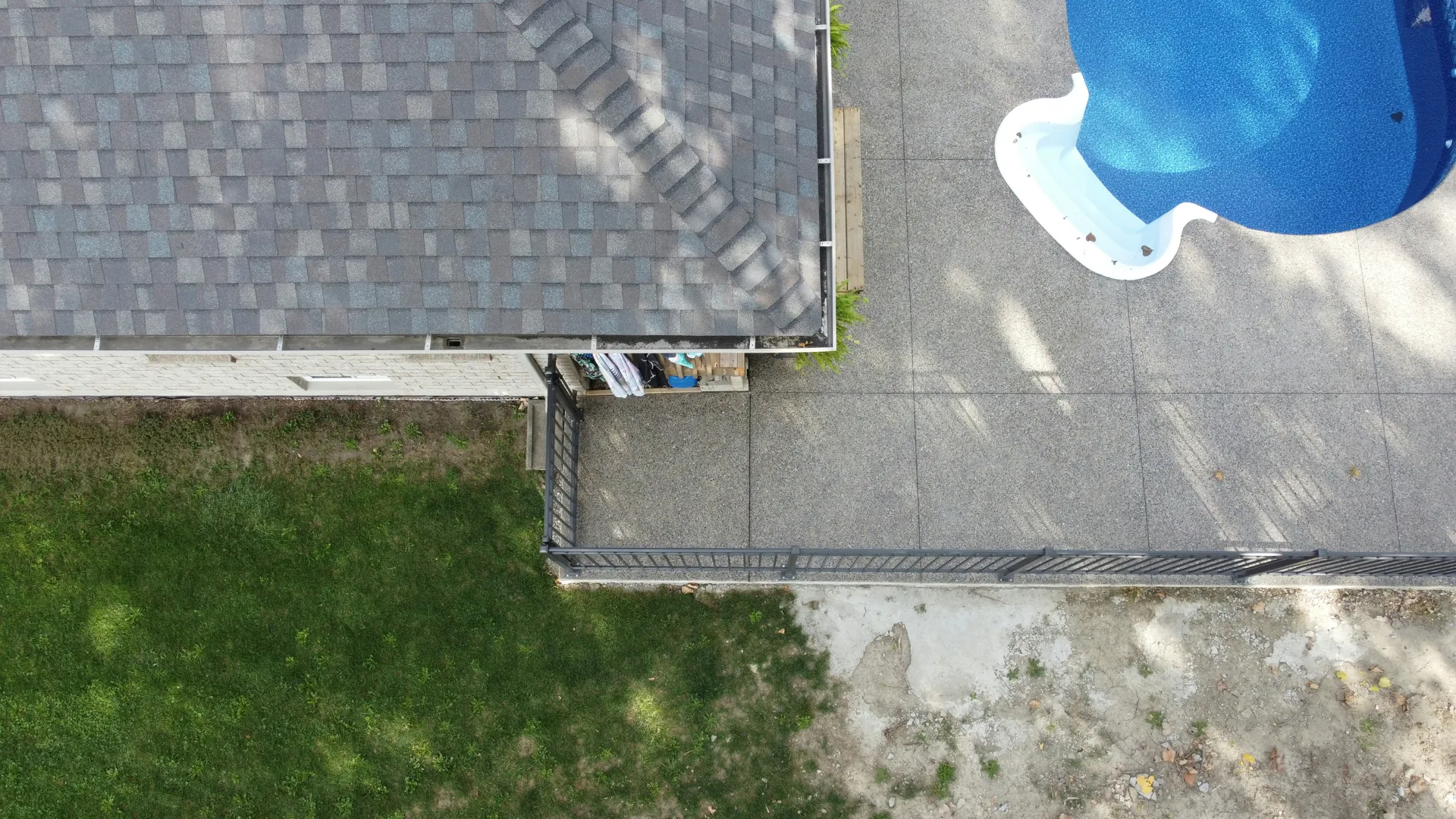 aerial view of a finished concrete pool deck in Laval